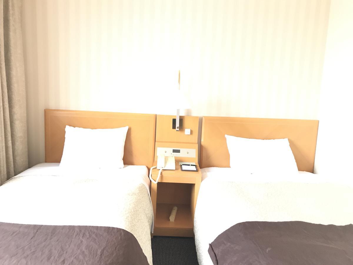 Numazu River Side Hotel Bagian luar foto